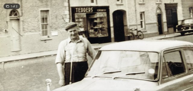 Patrick Raymond Tedders M.P.S.I. from Schrule, Co.. Mayo opened Tedders Chemist in Edenderry, Co. Offaly on Tuesday 27th December 1949. This premises was located on the western side on 70 J.K.L. Street. (Photograph shows Thomas Phelan from Rhode in front of the original Tedders Chemist)